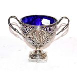 A late Victorian silver twin handled pedestal sugar basket by George Nathan & Ridley Hayes. With