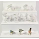 A quantity of white matte Kaiser animals including an elephant, squirrel and rabbit together with