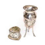 A Victorian silver vase and an Edward VII silver-mounted pin-cushion, Both by William Comyns,
