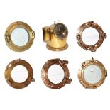 ~ Five brass ships portholes, two with glass, together with a brass cased marine compass on gimble