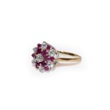 A 9 carat gold synthetic ruby and white stone cluster ring, finger size Q. Gross weight 3.0 grams.