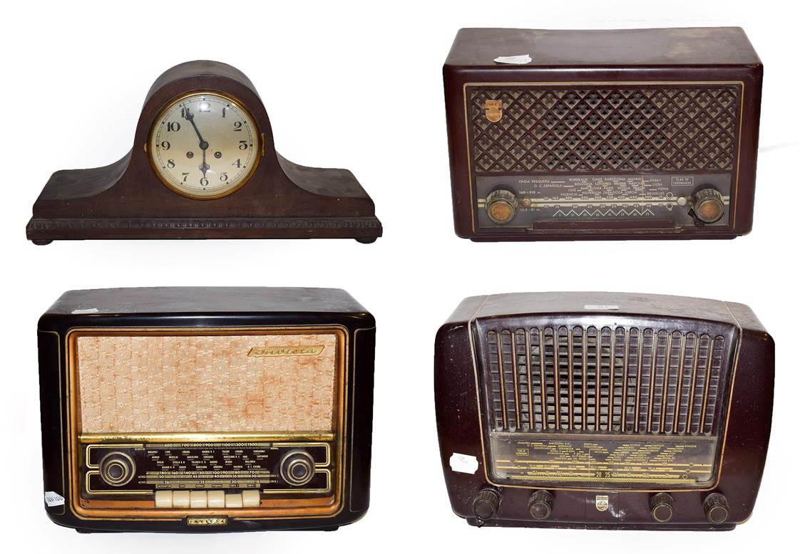 ~ An Invicta Bakelite valve radio, two Philips examples and an oak cased 8 day mantel clock striking