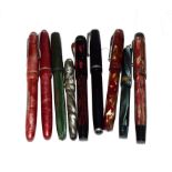 A fountain pen with nib stamped 14K, an Osmirod 65 Fountain pen another Osmirod 65 fountain pen, ''