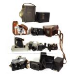 ~ Vintage cameras including bellows cameras and a Bakelite model 35 spy camera, makers include Agfa,