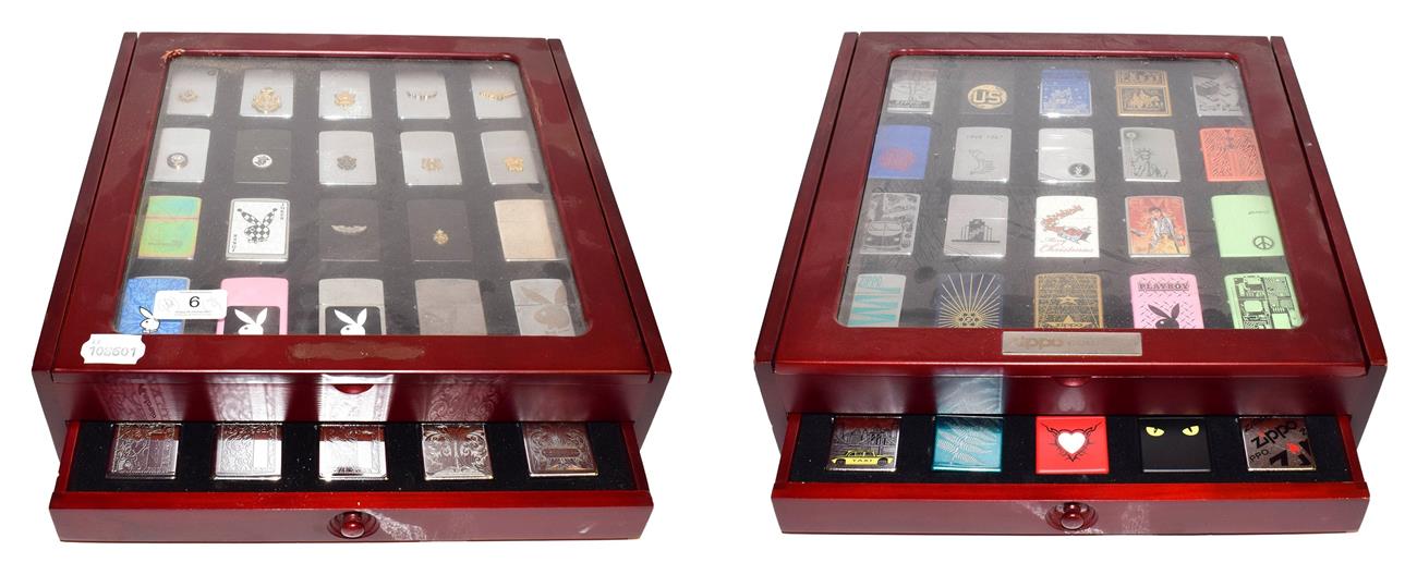 ~ Two collectors display cases each containing forty Zippo lighters over two layers, US Navy,