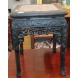 A Chinese pierced and carved hardwood square marble top plant stand, 35cm square by 47cm