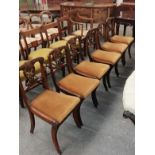 A set of six Regency rosewood cane-seated dining chairs
