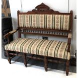 ~ A continental walnut part upholstered settle, 130cm long by 132cm high