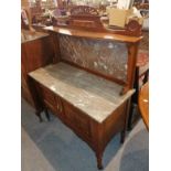 An Edwardian mahogany washstand with marble top and splashback, 107cm by 46cm by 140cm high