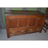 A joined oak chest with hinged lid