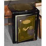 A Victorian Withy Grove Stores, Manchester painted cast iron safe (with key), 50cm square by 66cm