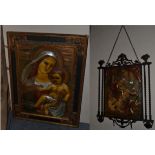 ~ Two relief polychrome plaques, one depicts the Virgin Mary and Child, the other St George and