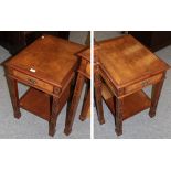 A pair of reproduction crossbanded burr walnut bedside tables, each fitted with a drawer and shelf