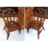 A pair of 19th century elm Windsor chairs (2)