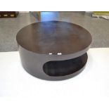 A French design ''Marrakesh'' coffee table, circular and on swivel base, manufactured by L'Autremond
