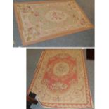 A Chinese ''Aubusson'' rug, the coral pink field centred by a floral medallion, framed by narrow