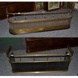 Two Victorian brass nursery fire fenders, the largest pierced (134cm wide) and the other meshed