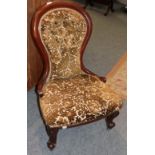 A Victorian mahogany framed nursing chair