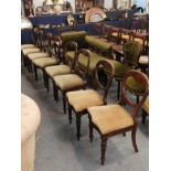 A set of eight Victorian mahogany balloon back dining chairs