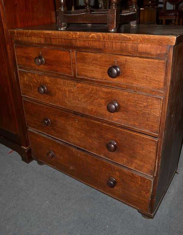 A 19th century oak four high straight fronted chest of drawers, 111cm by 53cm by 115cm high