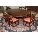A reproduction mahogany pedestal dining table with two additional leaves, 210cm by 120cm by 74cm,