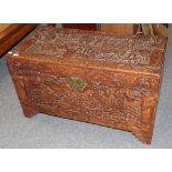 A 20th century Chinese carved camphor wood chest, 105cm by 52cm by 60cm high