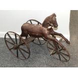 ~ A 19th century carved wooden and iron pedal horse