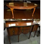 A reproduction oval inlaid quarter veneered walnut coffee table, 122cm by 86cm by 43cm, together
