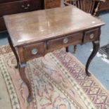 An 18th century walnut lowboy, 83cm by 56cm by 71cm high