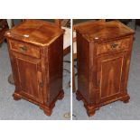 A pair of early 20th century crossbanded and inlaid walnut bedside cupboards, 43cm by 29cm by 74cm