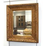 ~ A gilt framed mirror