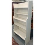 A white painted pine waterfall bookcase, 93cm by 40cm by 180cm