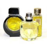 Large Azzaro by Loris Azzaro Paris Dummy Factice in a circular glass bottle, held within a