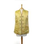 Early 20th Century Yellow Chinese Brocade Waistcoat, with toggle fastenings and a brown wool lining