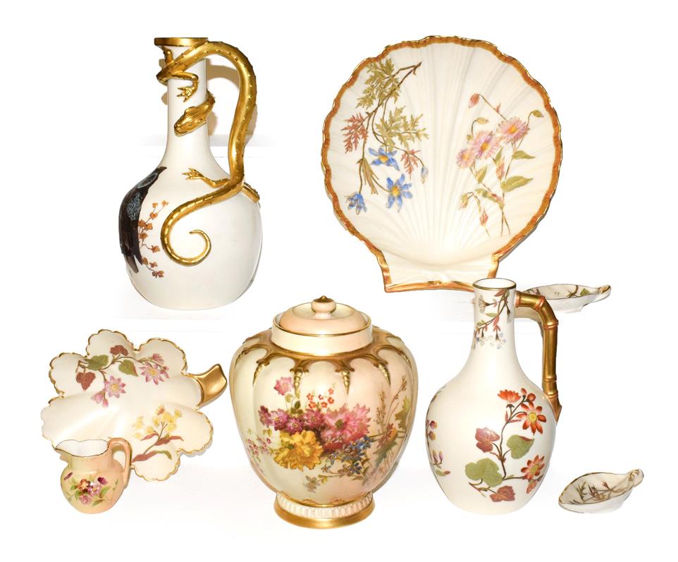 A collection of Royal Worcester blush ware, including a lizard handled ewer painted with an owl,