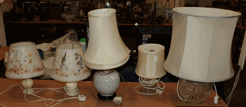 An Atlantis crystal table lamp together with a cut glass based table lamps, a crackle glazed example