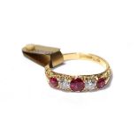 A synthetic ruby and diamond five stone ring, three graduated round cut synthetic rubies alternate