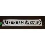 A 19th century cast iron street sign ''Markham avenue'' repainted, reportedly Blitz recovered,