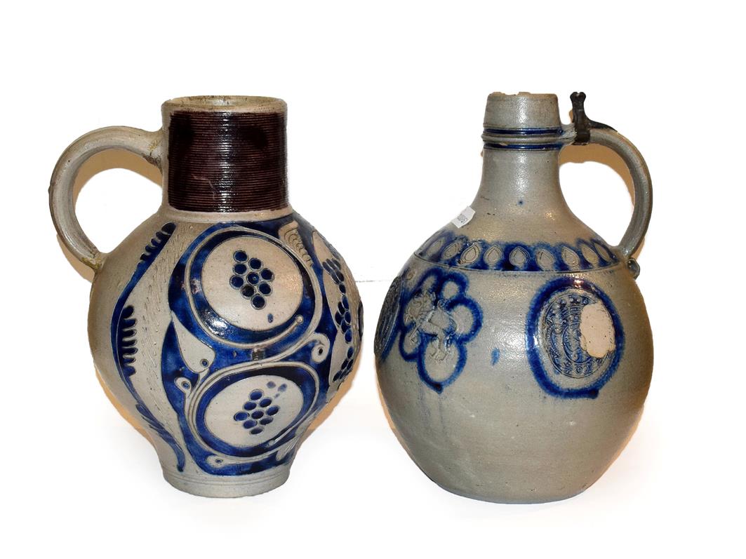 Two 18th century German Westerwald salt glazed stoneware flagons, one with a Royal monogram GR,