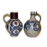 Two 18th century German Westerwald salt glazed stoneware flagons, one with a Royal monogram GR,