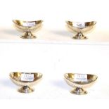 A set of four silver boat shaped salts, London 1902, (4)