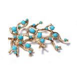 An abstract brooch, set throughout with blue stones, unmarked, length 6.3cm . Gross weight 19.1