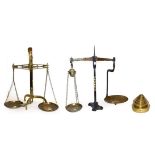 Two sets of Victorian W & T Avery weighing scales, together with a set of graduated brass weights (