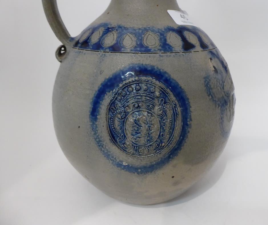 Two 18th century German Westerwald salt glazed stoneware flagons, one with a Royal monogram GR, - Image 13 of 20