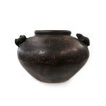 A Chinese Cizhou style guan, possibly Ming, of ovoid form, modelled with twin toad handles, 24cm