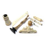 A quantity of 19th century ivory and bone items including a beehive form tape measure, monocular