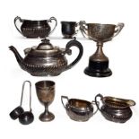 A tray of silver items including a George V three part tea service by Harrison Brothers & Howson,