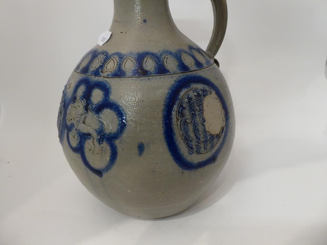 Two 18th century German Westerwald salt glazed stoneware flagons, one with a Royal monogram GR, - Image 15 of 20