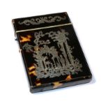 A Victorian tortoiseshell and silver inlaid card case, decorated with a folly, foliate scrolls and