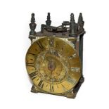 An early 18th century Lantern form clock dial and movement, unsigned, (parts missing) (a.f.)